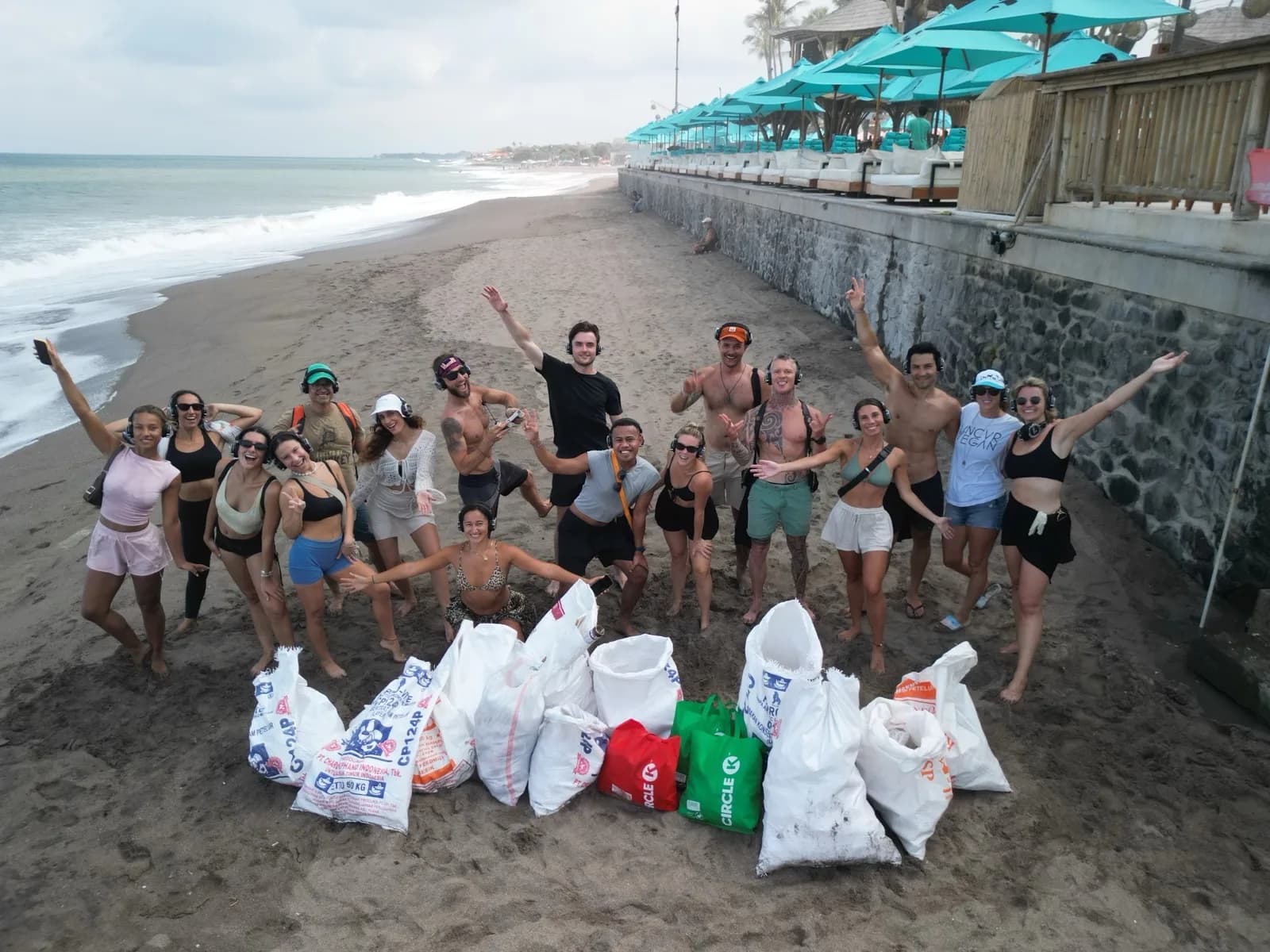 Arms up behind a morning's worth of bags