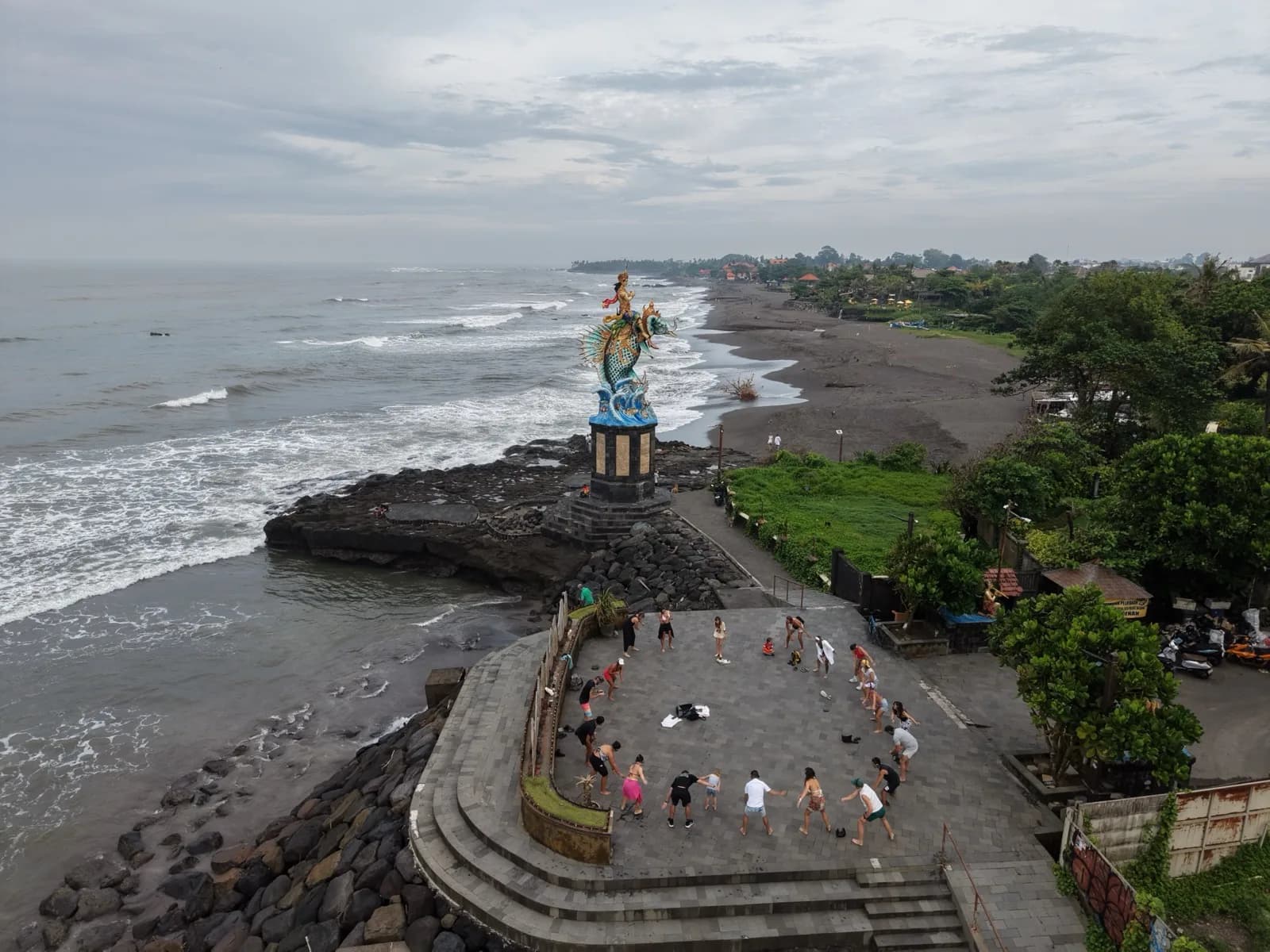 Gathering on the point by the statue